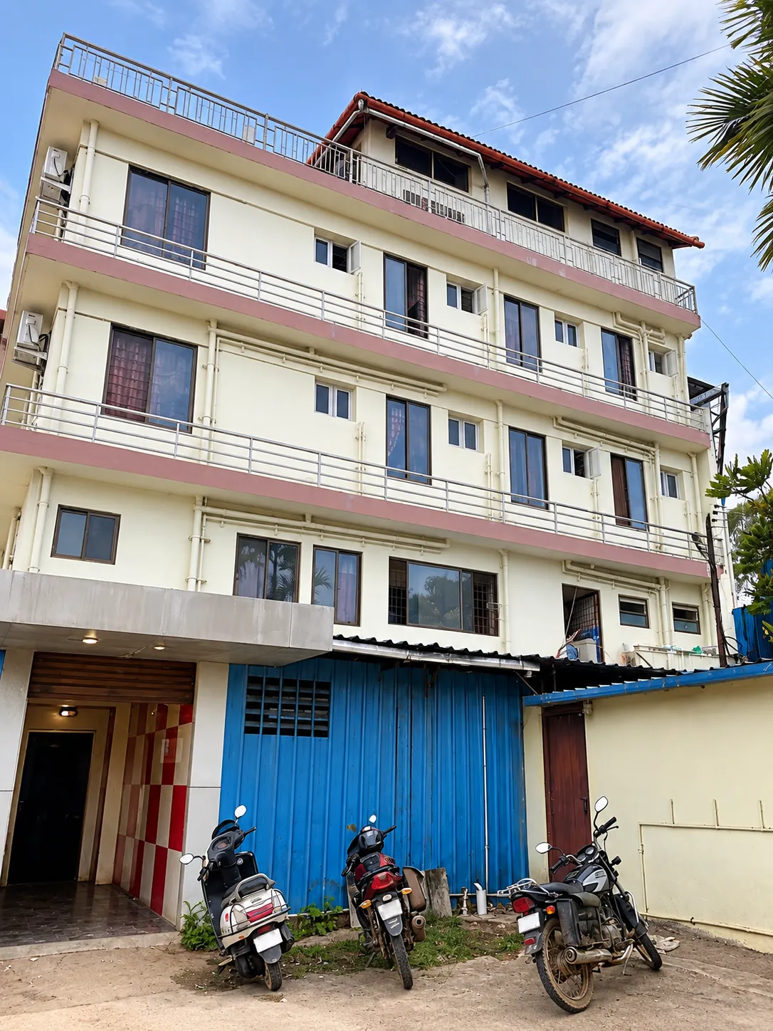 Urban Building with Parked Scooters